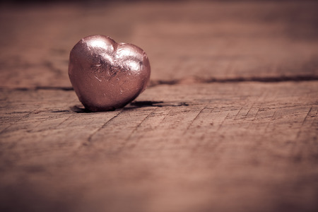 heart on wooden background, valentine's day and romance conceptの写真素材