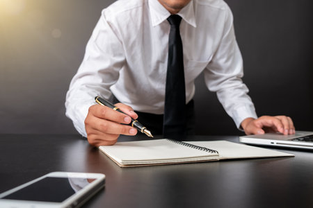 Business and banking concept close up business man signing contract making a deal.の写真素材