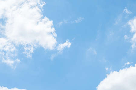 Beautiful blue clear sky background with tiny cloudsの写真素材