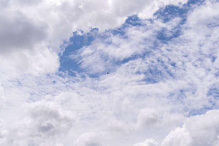 Beautiful blue clear sky background with tiny cloudsの写真素材