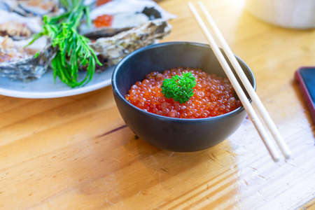 Japanese food ikura sashimi (salmon roe, red caviar, salmon caviar)の写真素材