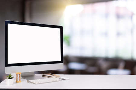 laptop monitor digital pc desk Mockup Blank screen computer desktop with keyboard in cafe & restaurant or co-working background.の写真素材