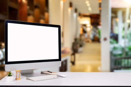 laptop monitor digital pc desk Mockup Blank screen computer desktop with keyboard in cafe & restaurant or co-working background.の写真素材
