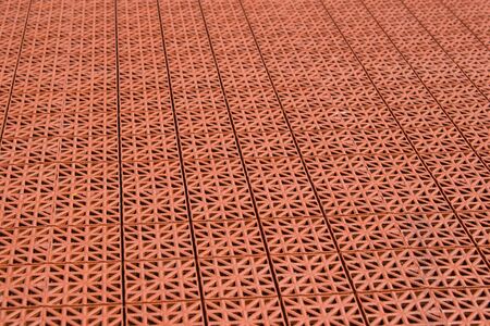 Artificial tennis court cover, brown, close-upの写真素材