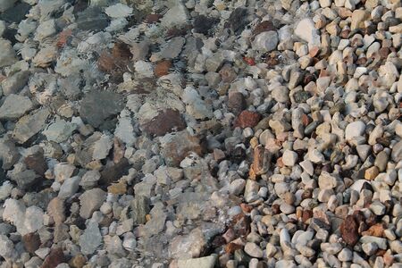 Pebbles in the clear water,の写真素材