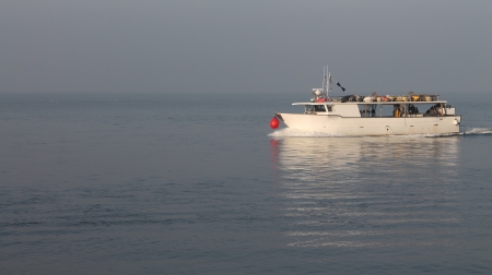 fishing boat returning from fishingの写真素材