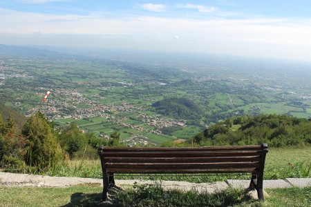 bench on top of a mountain panoramaの写真素材