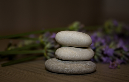 Pyramid of three stones with reflect. Soft focus.の写真素材