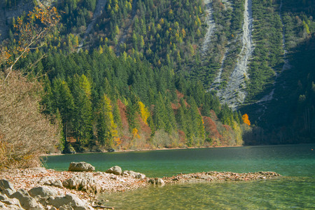 autumnal view of the Tovel Lake, Trentino Italy.の写真素材