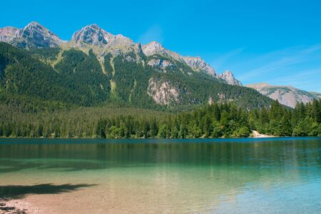 autumnal view of the Tovel Lake, Trentino Italy. Lago di Tovelの写真素材