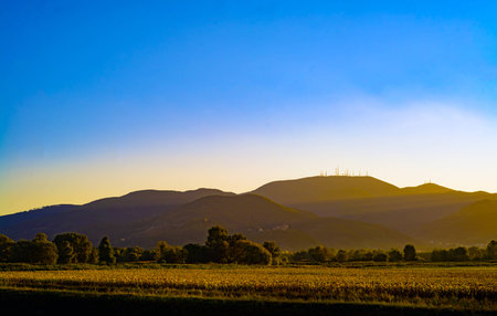 last sunbeam during a sunset in tuscany