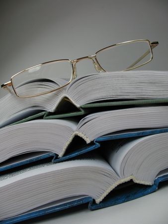 The Book is source knowledges. Spectacles very necessary accessory for people with bad visionの写真素材