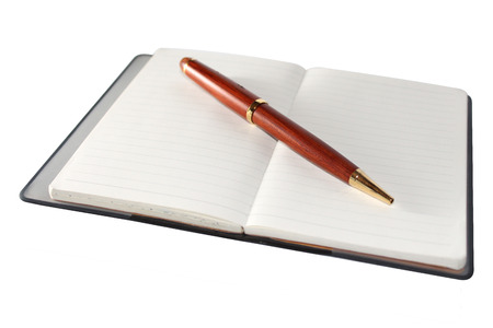 A notebook (notepad, writing pad, drawing pad, legal pad) is a small book or binder of paper pages, often ruled, used for purposes such as recording notes or memoranda, writing, drawing, or scrapbooking.の写真素材