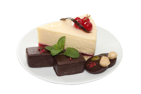 Cheesecake is a sweet dessert consisting of one or more layers. The main, and thickest layer, consists of a mixture of soft, fresh cheese, eggs, and sugar. Is usually sweetened with sugar and may be flavored or topped with fruit, cream, nuts.の写真素材