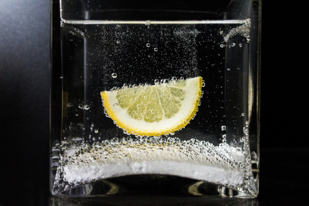 Fresh fruit in water with bubbles.の写真素材