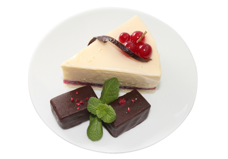 Cheesecake is a sweet dessert consisting of one or more layers. The main, and thickest layer, consists of a mixture of soft, fresh cheese, eggs, and sugar. Is usually sweetened with sugar and may be flavored or topped with fruit, cream, nuts.の写真素材