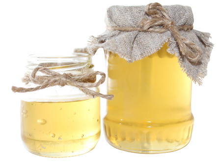 Honey is a sweet food made by bees foraging nectar from flowers. The variety produced by honey bees is the one most commonly referred to, as it is the type of honey collected by most beekeepers and consumed by people.の写真素材