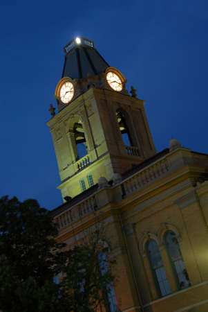 Small town Springfield Tennessee Robertson County Court House nightscape clock tower. Angled view from ground up to top in the deep blue night sky.の写真素材