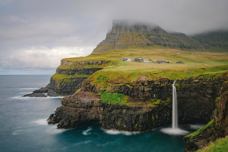 Spectacular waterfall in Gasadalur village, Faroe islandの写真素材