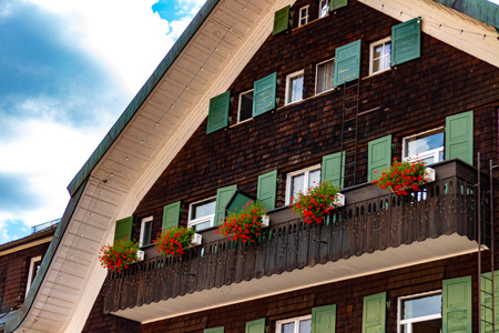 Typical building in Titisee-Neustadt with flowers in front of the windownsのeditorial素材