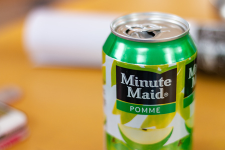BREDA, NETHERLANDS - AUGUST 26 2018: Minute Maid trademark brand logo on a can of soda served in a restaurant in Breda Netherlandsのeditorial素材