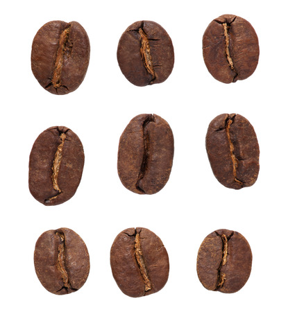 set of nine close up roasted coffee beans isolated on whiteの写真素材