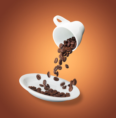 composition of coffee beans which is poured from a cup into a saucer on gradient backgroundの写真素材