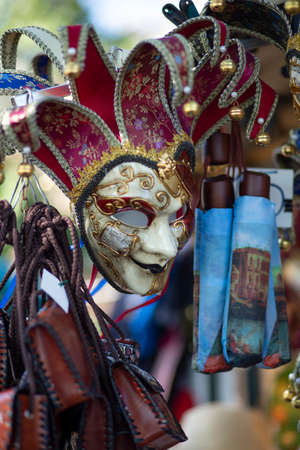 street stalls in st marks square selling venation masks and t,shirts and hats aimed at the many tourists that flock to Venice every yearのeditorial素材