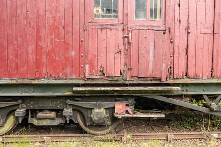 old abandoned  wooden red train carriage