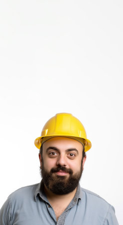 Portrait of happy young foreman with yellow hard hat,  Created using generative AI tools.の素材