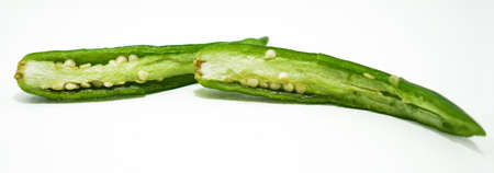 fresh cayenne pepper cut to slices showing the inside