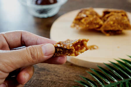 teng teng, indonesian crunchy meal or snack made of palm sugar and peanuts