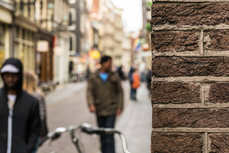 Peeking around the corner in Amsterdamの写真素材