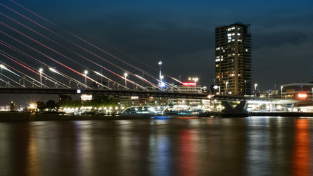 Rotterdam, The Netherlands - May 2017: Erasmusbrug bridge at night by Noordereilandのeditorial素材