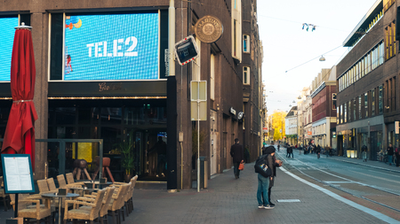 Amsterdam, The Netherlands - May 10, 2017. Advertising Tele2 in the city center.のeditorial素材