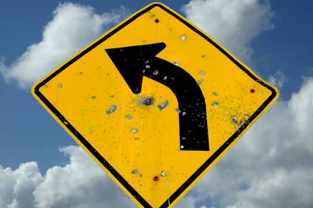 Road Sign with Bullet Holes, Sutter Buttes California, USAの写真素材