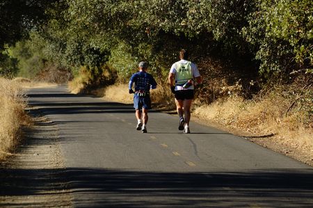 Visually Impaired Man Jogging With Guide