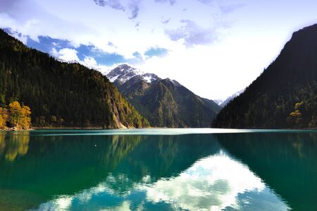 Forest and Lake in Jiuzhaigou, Sichuan province of Chinaの写真素材