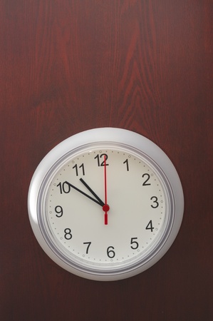 Clock on the wooden boardの写真素材