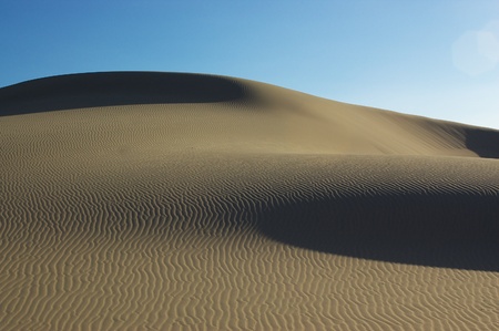 Desert landscape under blue skyの写真素材