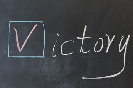 Chalkboard writing - Victory word in Egnlishの写真素材