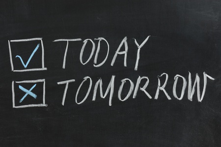 Chalkboard drawing - Choose from today or tommowの写真素材
