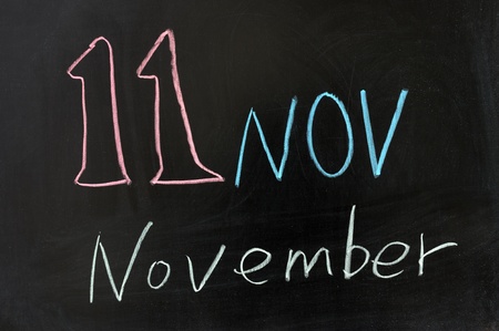 Chalk drawing - November words written on chalkboardの写真素材