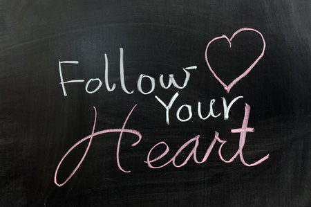 Conceptional chalk drawing - Follow your heartの写真素材
