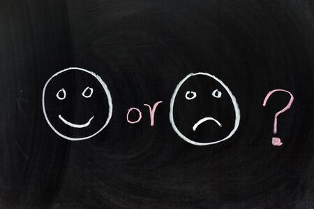 Chalk drawing - Happy or sad ?の写真素材