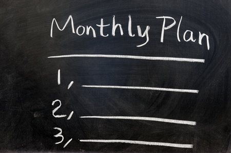 Chalk writing - Monthly plan on chalkboardの写真素材