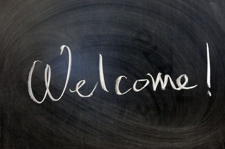 Chalk writing - Welcome word written on chalkboardの写真素材