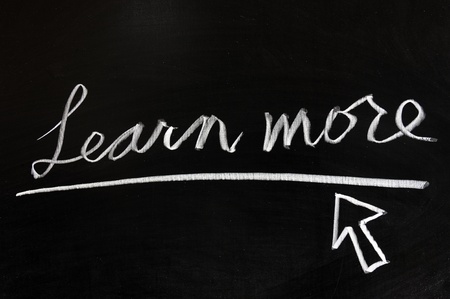 Learn more words and mouse pointer drawn on chalkboard
