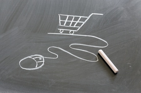 Shopping cart and computer mouse drawn on chalkboardの写真素材