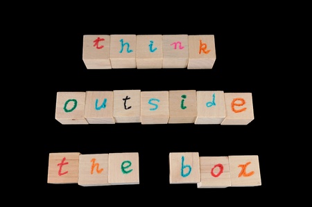 Think outside the box words on wooden cubes